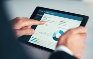 Investment, corporate or business person with tablet for invest strategy, finance growth or financial review. Hand, screen or analytics on technology for planning, data analysis or economy data research